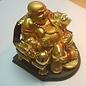 golden laughing Buddha on chair 12x13x13cm