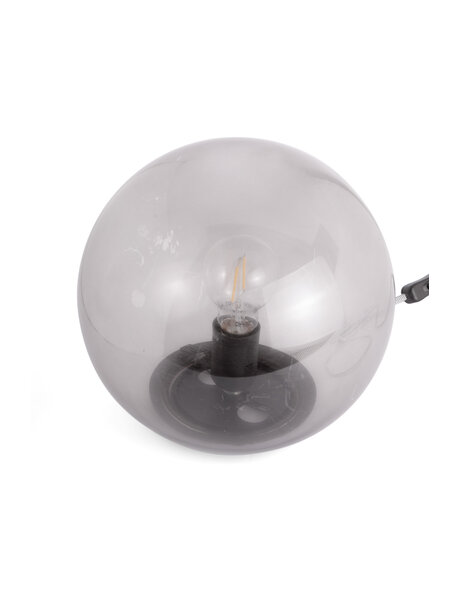 Design tafellamp van bruin helder glas