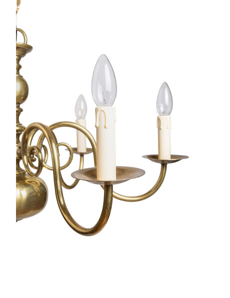 Old chandelier, yellow brass