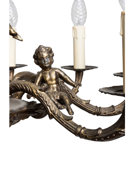 Old chandelier, burnished, with angels