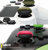 Skull & Co. 6 agarres para el pulgar para PlayStation 4 y 5 - Tapas de control antideslizantes PS4 / PS5 - Verde y rosa