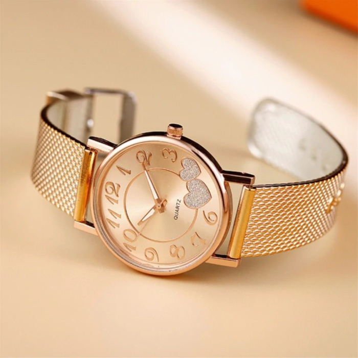 Montre avec coeurs pour femme - Quartz Luxury Anologue Movement Maille en acier inoxydable pour femme en or rose