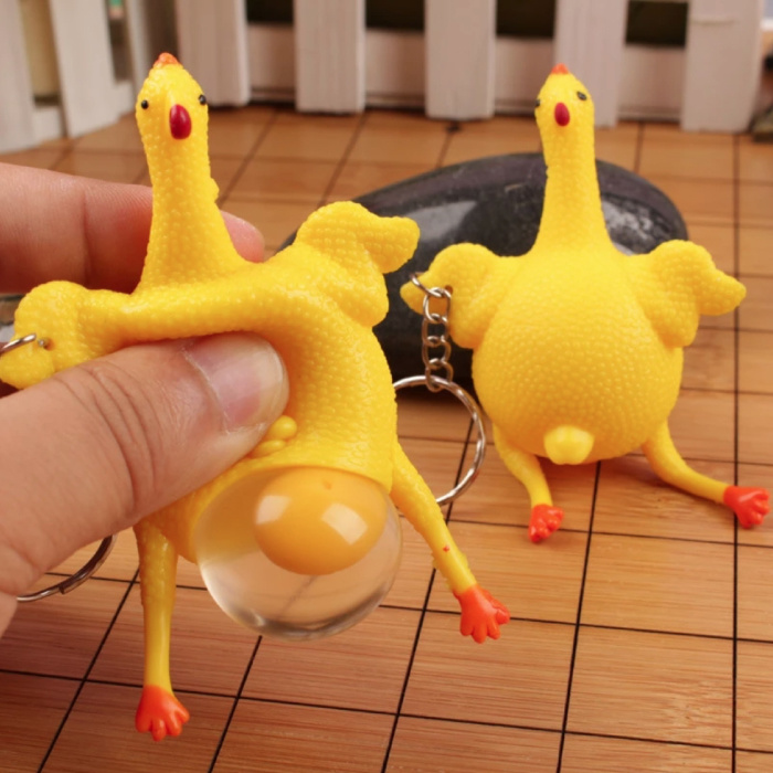 Squeeze Chicken Schlüsselanhänger mit Ei - Squishy Chicken Fidget Anti-Stress-Spielzeug Silikon Gelb