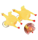 Stuff Certified® Squeeze Chicken Schlüsselanhänger mit Ei - Squishy Chicken Fidget Anti-Stress-Spielzeug Silikon Gelb