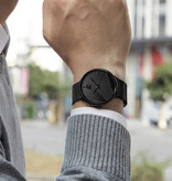 DIJANES Montre minimaliste pour homme - Bracelet en cuir noir à mouvement à quartz ultra-fin à la mode