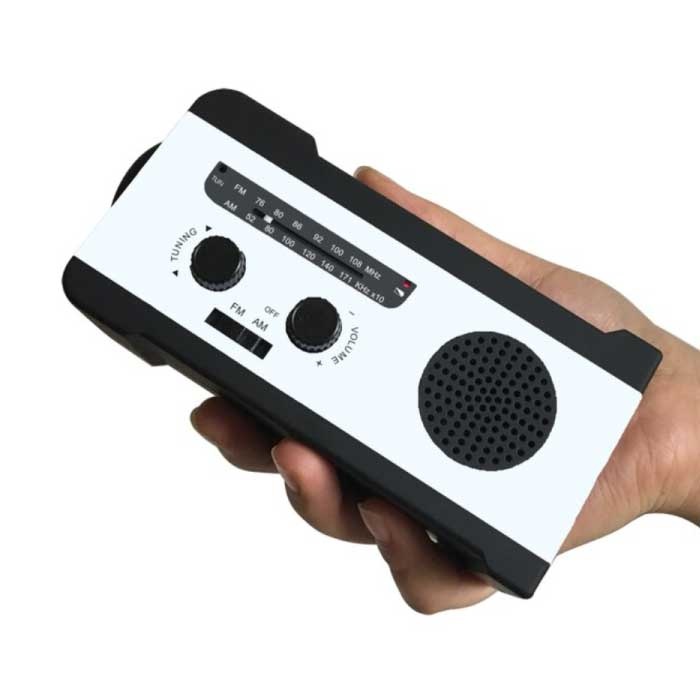 Stuff Certified® Banque d'alimentation solaire radio 2000 mAh avec dynamo - Lampe de poche intégrée - Chargeur de batterie de secours externe FM/AM Bleu