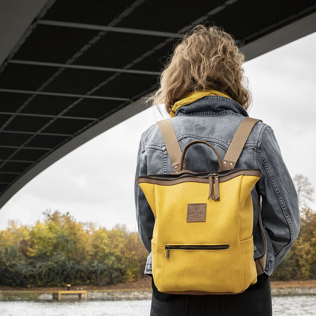 yellow leather rucksack