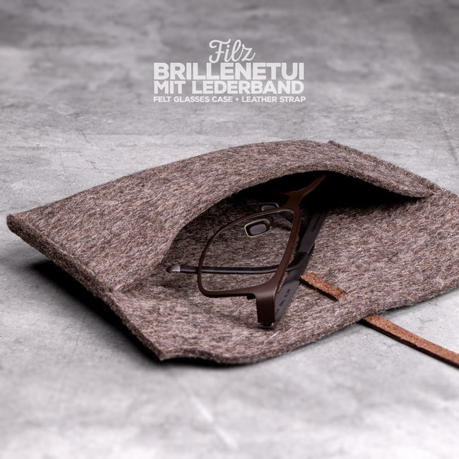 handgemachtes Filz Brillenetui: das Lederband schließt es