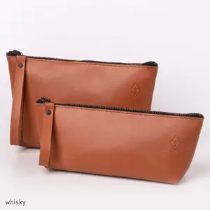Cosmetic pouch in cowhide leather, large & small