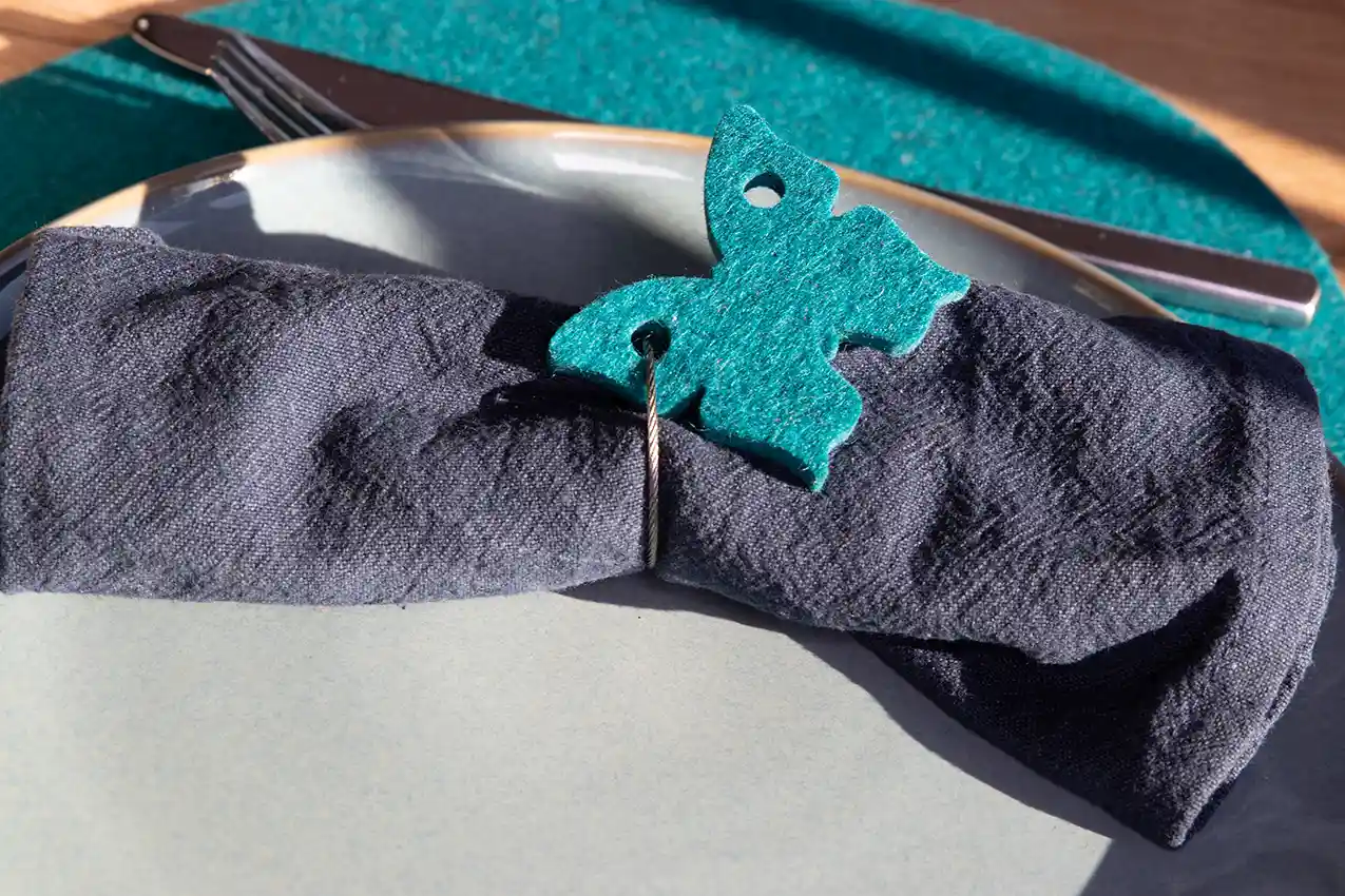 Napkin with butterfly key ring as a napkin ring