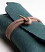 handmade felt glasses case: closed by a leather strap