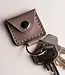 Shoping cart chip keychain of leather with a wooden token