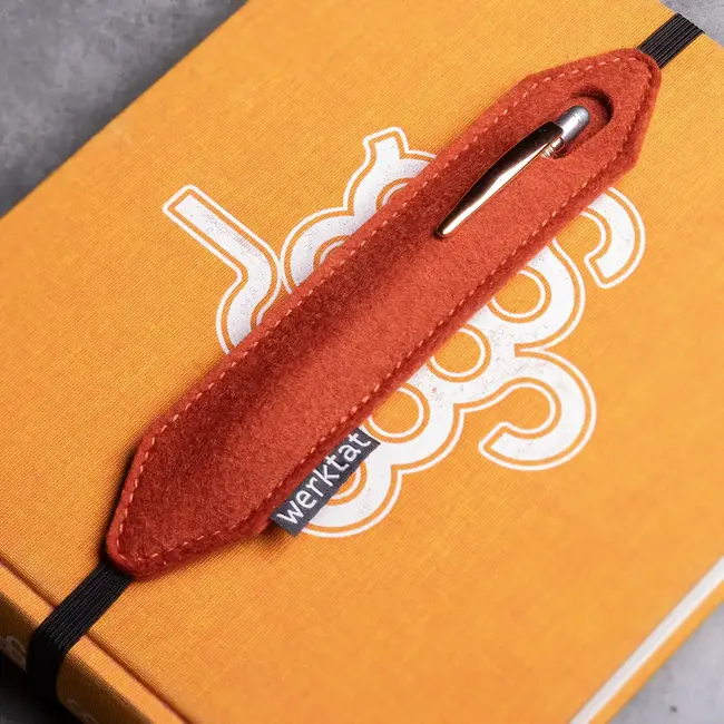 Pen holder of felt with rubber band