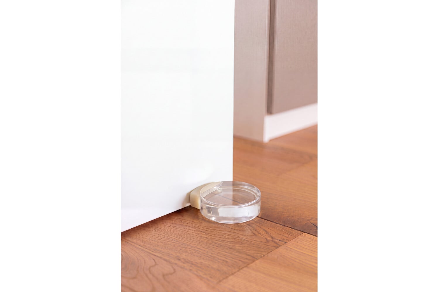 Ronde deurstopper met zijbuffer (transparant)