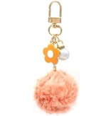 Tas sleutelhanger met fluffy bol en een klaver en parel