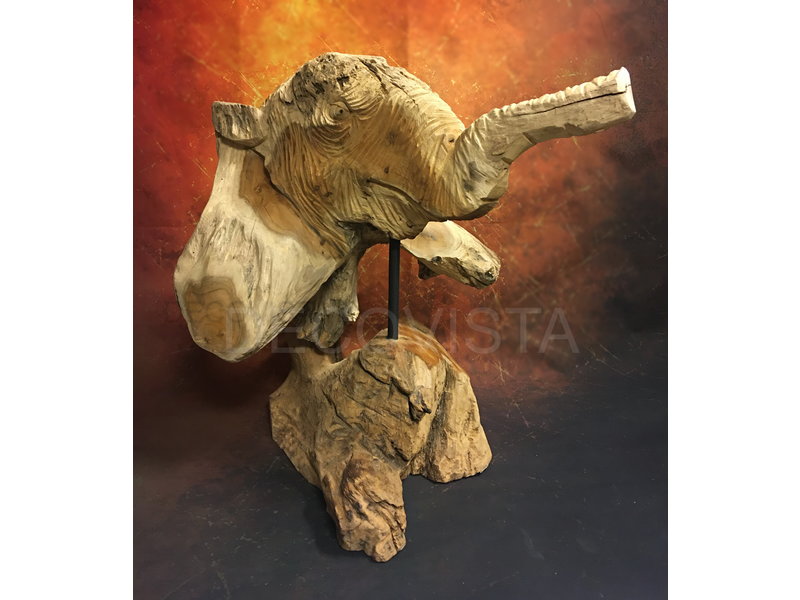 head of an elephant carved from wood