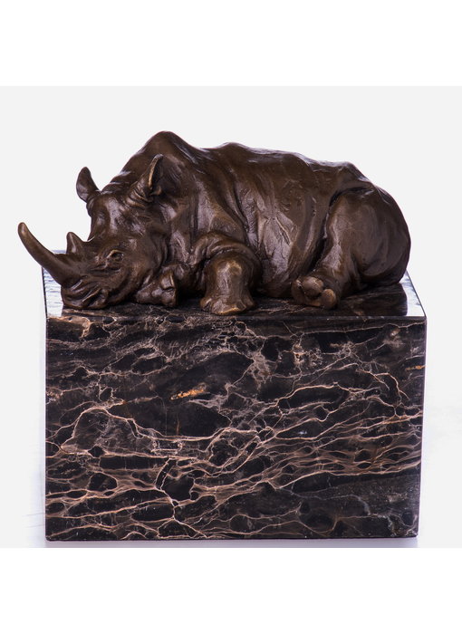 Bronze rhinoceros - lying down