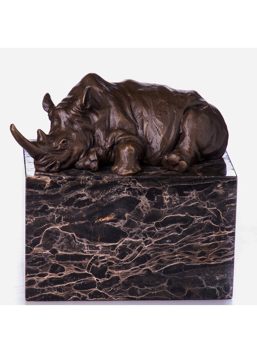 Rinoceronte de bronce - acostado