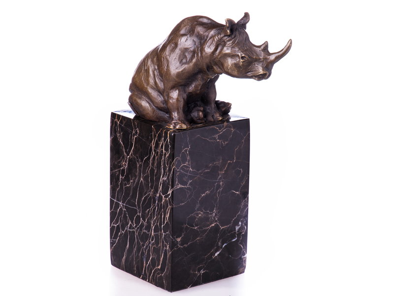 Figurilla de rinoceronte de bronce sobre base de mármol