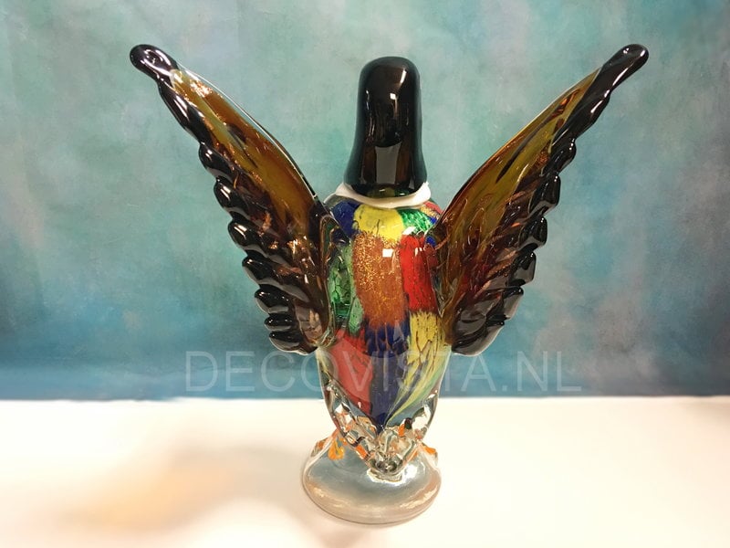 Colorful duck with raised wings, glass object