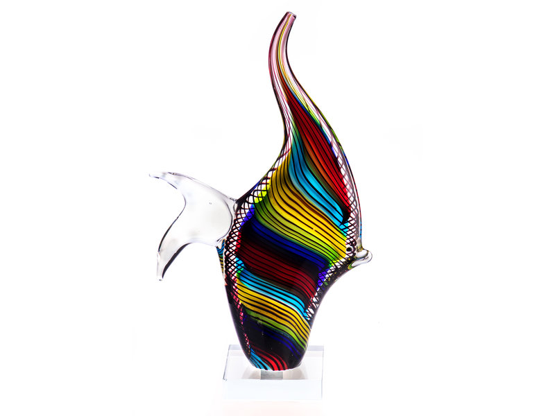 Multicolored striped tropical fish on pedestal