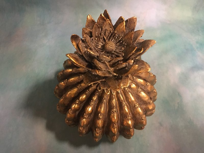 Barrel cactus decoration in vintage gold