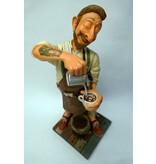 Forchino Art image of a typical barista preparing coffee