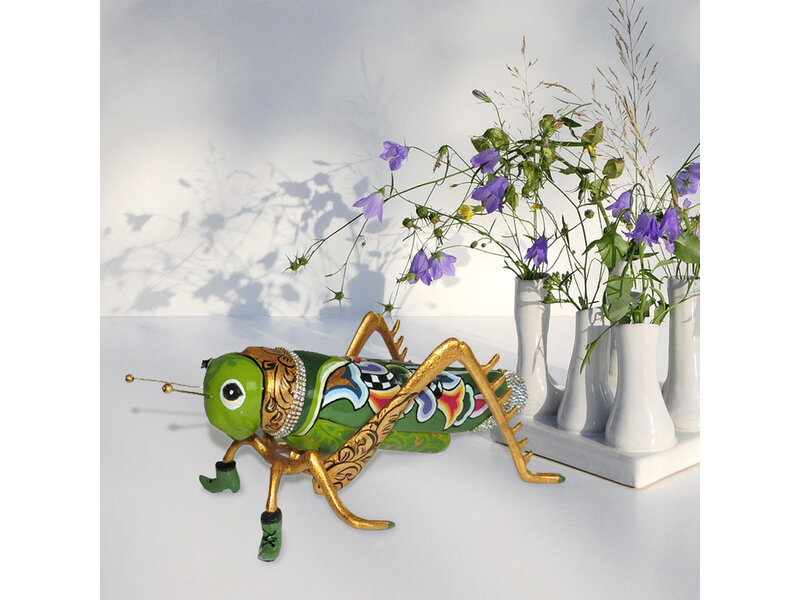 Toms Drag Grasshopper sculpture