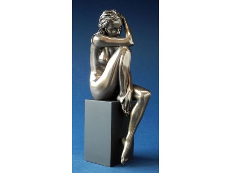 BodyTalk Naked woman sitting on black base