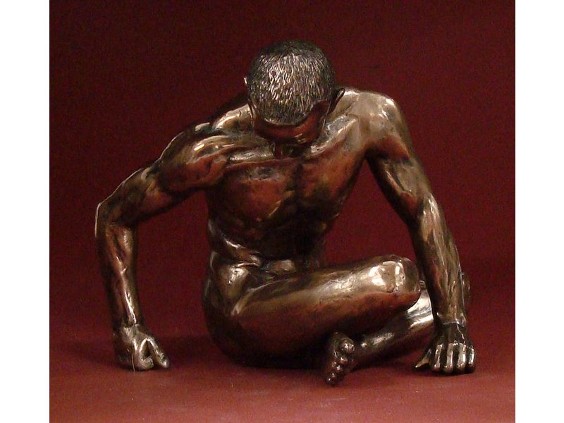 BodyTalk Male nude bodybuilder, cross legged