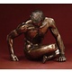 Bodybuilder in kleermakerszit