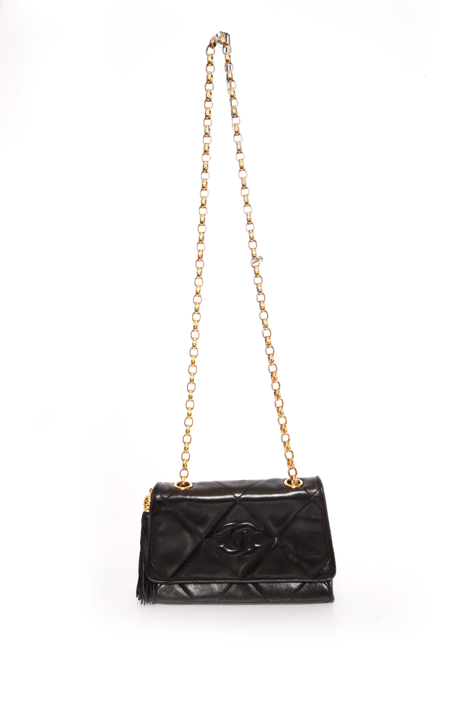 Chanel, Vintage black Lambskin quilted shoulder bag with tassel and gold  hardware. - Unique Designer Pieces