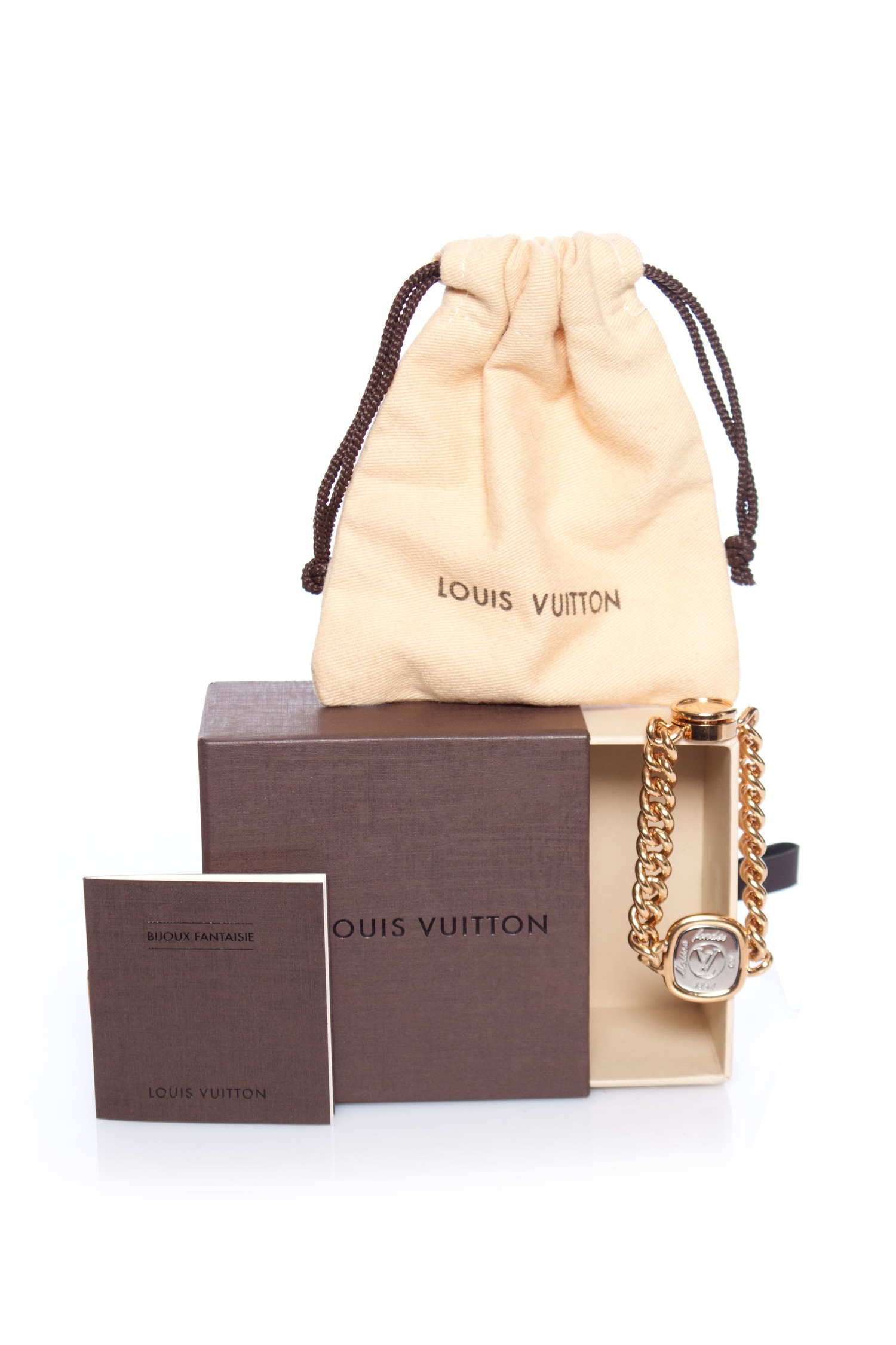 Louis Vuitton, Gold-plated and palladium-plated brass I.D.