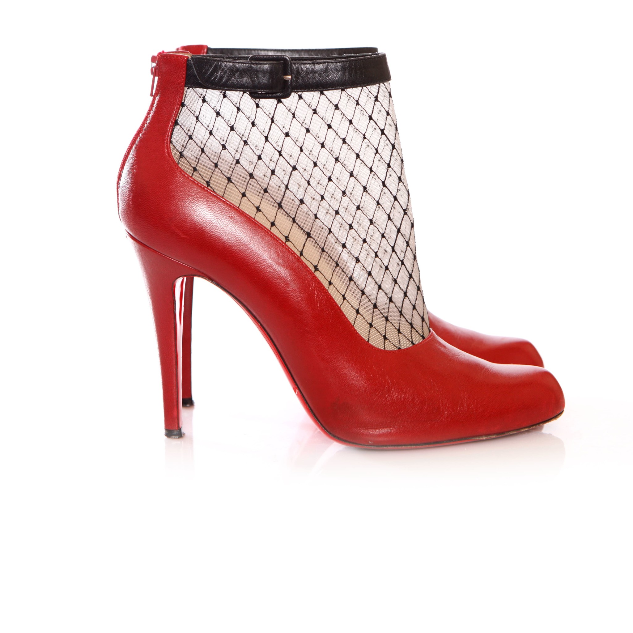 Christian Louboutin red leather ankle boots. Unique Designer Pieces