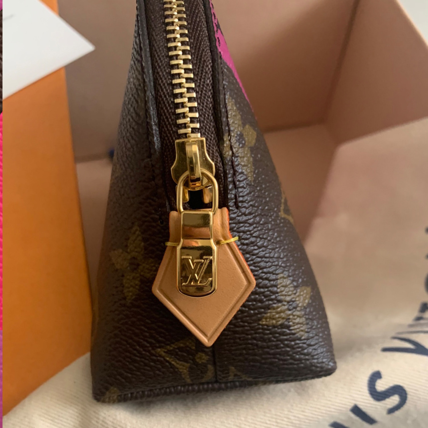 Adding a chain to the new Louis Vuitton GM Cosmetic Pouch is a game ch