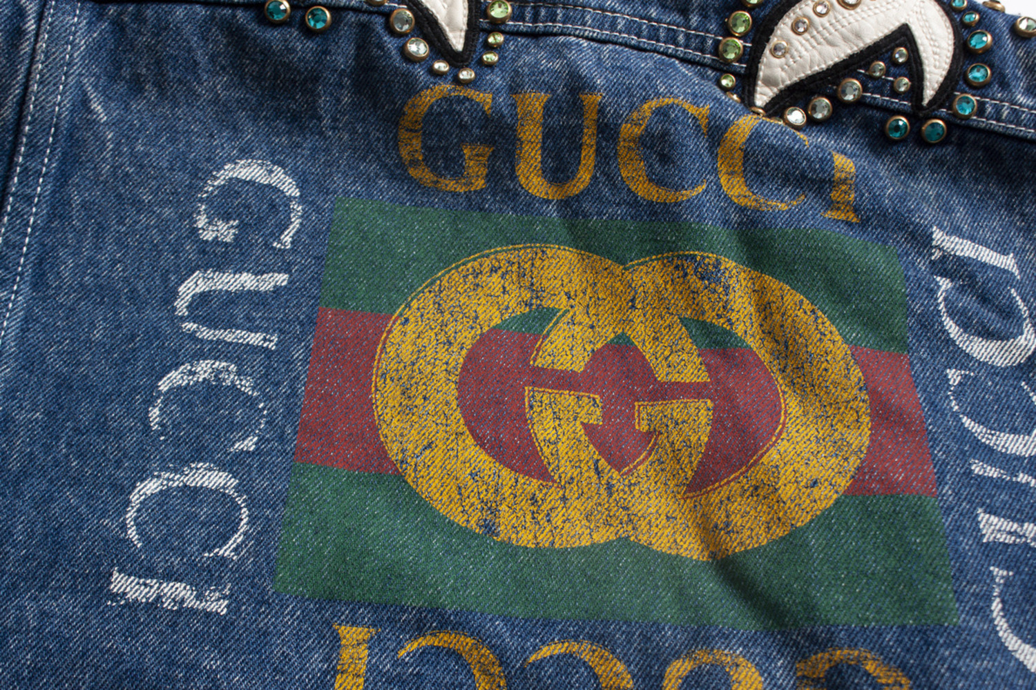 Gucci, Logo printed denim jacket with floral appliques - Unique