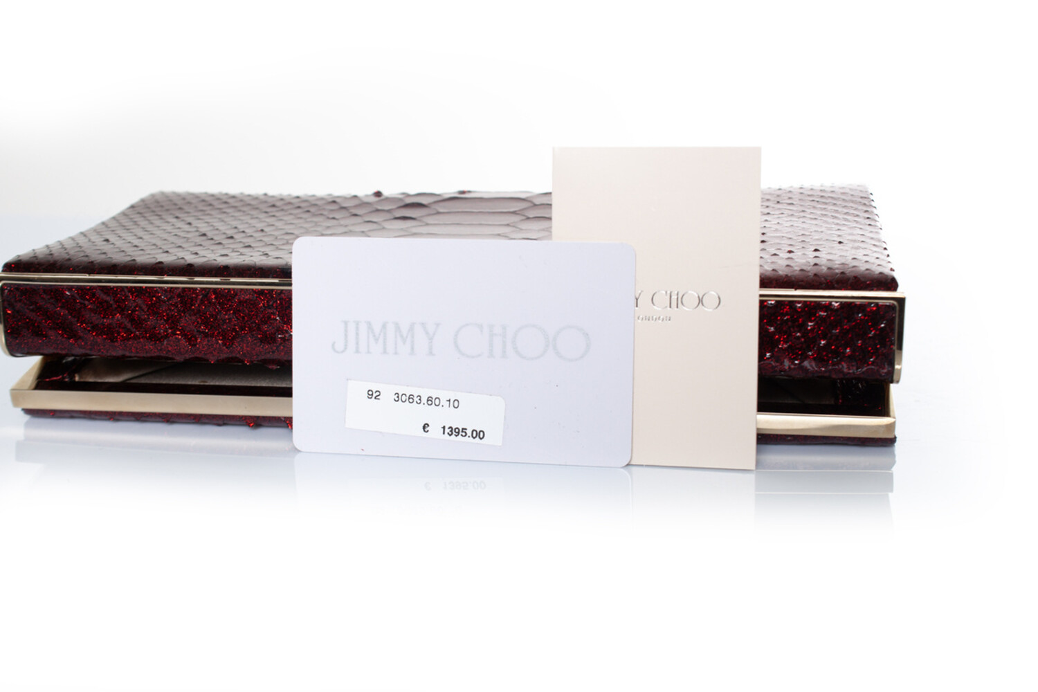 Jimmy Choo, python leather clutch in metallic red - Unique 