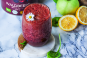 Organic toning apple and beetroot smoothie.