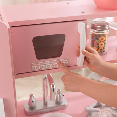 Cuisiniere en bois rose pour enfants