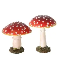 Decoratieve paddenstoel rood wit van polyresin