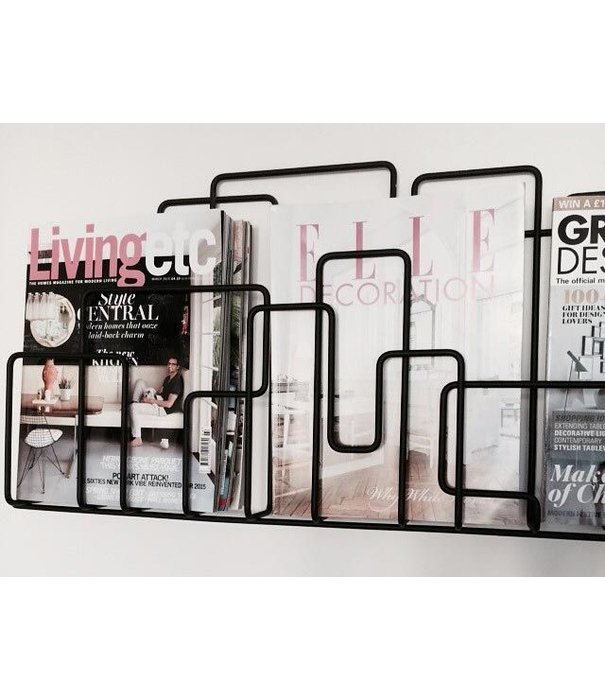 Maze  Maze - City Sunday magazine rack