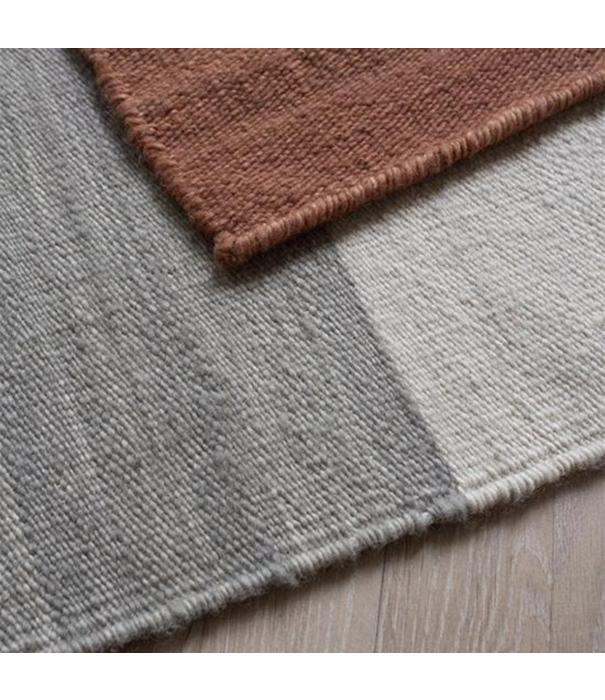 Layered  Layered - Solitaire wool rug coral