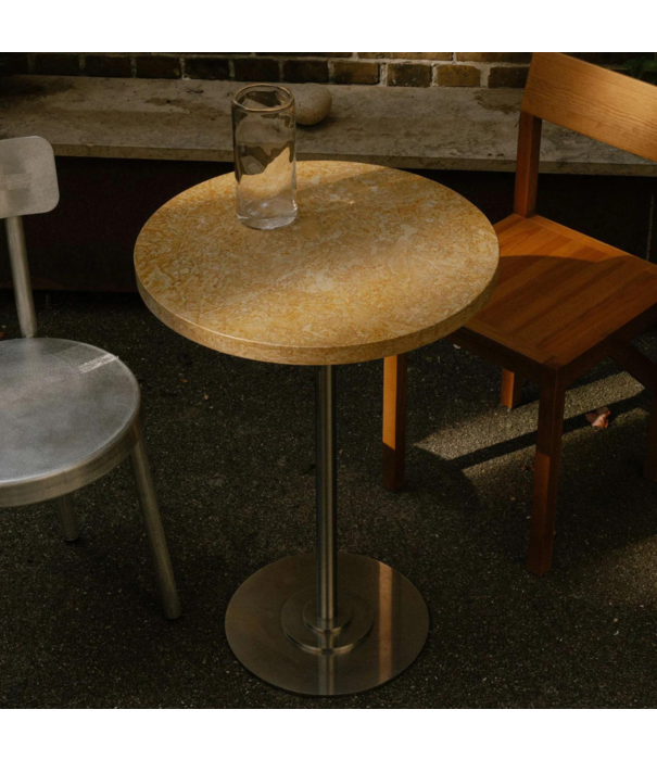 Frama  Table 57 yellow limestone, stainless steel base