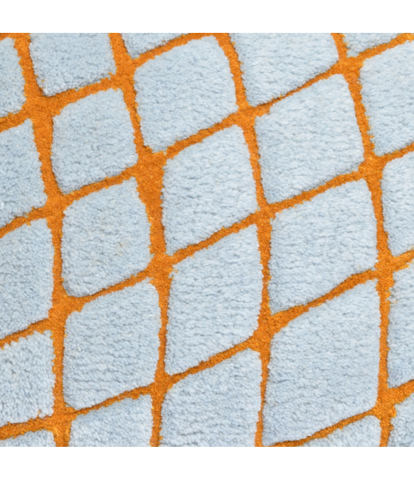 Haus Üger Grid Cushion – Blue with orange grid pattern