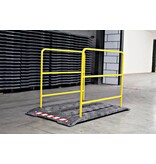 Construction site footbridge with yellow handrails