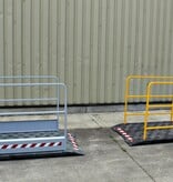 Construction site footbridge with grey handrails