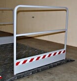 Construction site footbridge with grey handrails