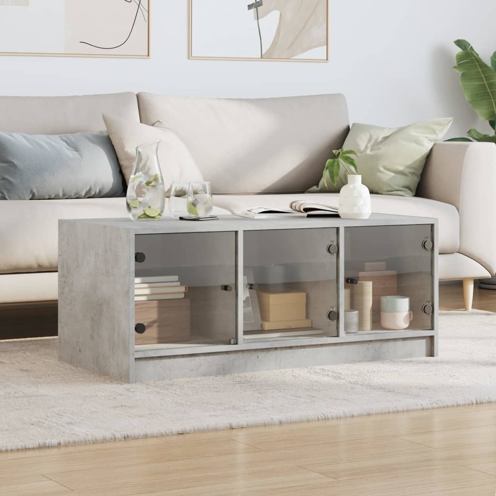 VidaXL Salontafel met glazen deuren 102x50x42 cm betongrijs