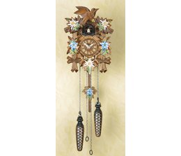 Trenkle Uhren Wonderful deep-carved cuckoo clock 22cm with edelweiss gentian hand-painted in the Black Forest made with quartz drive and cuckoo call with light sensor under the dial, as soon as it gets dark the cuckoo call switches off