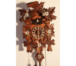 Hettich Uhren Cuckoo clock with quartz movement 23cm high and 18cm wide with hand-painted flowers Edelweiss 12 different melodies Cuckoo calls every hour